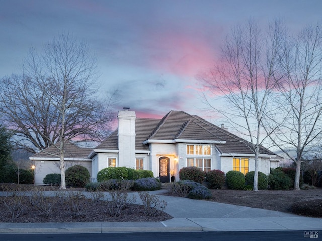 1706 Garnett Creek Ct, Calistoga, CA 94515 - view of front of house featuring a chimney and stucco siding