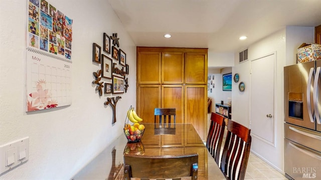 dining space featuring recessed lighting and visible vents