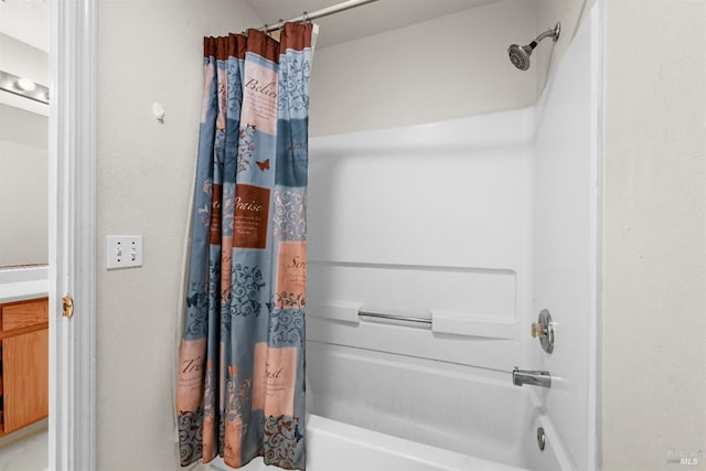 bathroom featuring shower / bathtub combination with curtain
