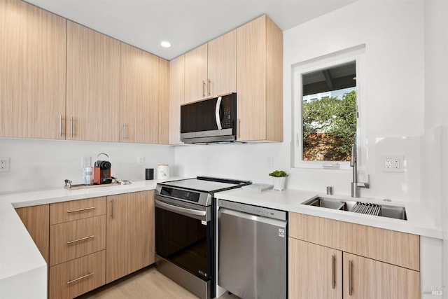 45 Harbor Oak Dr Unit 35, Tiburon, CA 94920 - kitchen featuring a sink, appliances with stainless steel finishes, light brown cabinetry, and light countertops