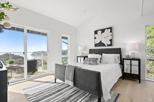45 Harbor Oak Dr Unit 35, Tiburon, CA 94920 - bedroom featuring light wood finished floors, high vaulted ceiling, and access to outside