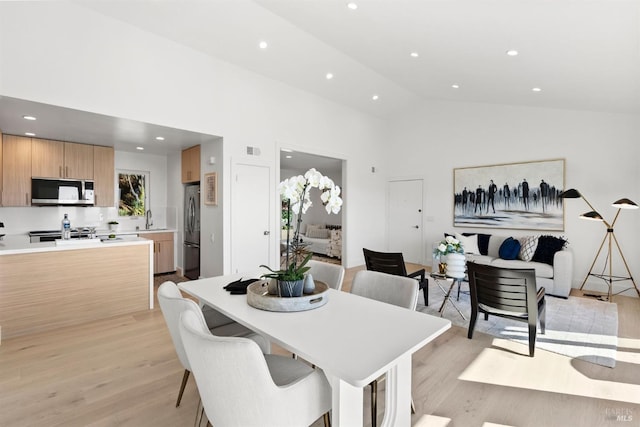 45 Harbor Oak Dr Unit 35, Tiburon, CA 94920 - dining room featuring recessed lighting, light wood-style floors, and high vaulted ceiling