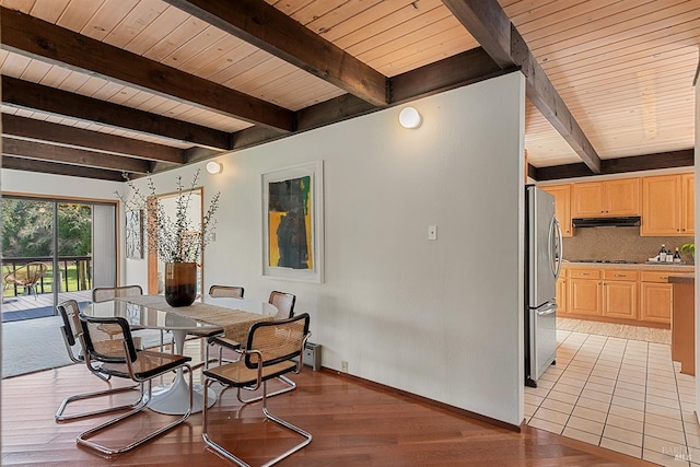 3651 Bones Rd, Sebastopol, CA 95472 - dining space with wooden ceiling, beamed ceiling, light wood-style flooring, and baseboards