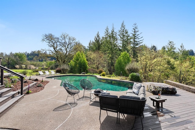 3651 Bones Rd, Sebastopol, CA 95472 - outdoor pool featuring a patio area, a wooden deck, and an outdoor living space