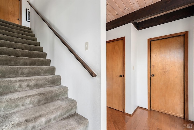 3651 Bones Rd, Sebastopol, CA 95472 - staircase with wood-type flooring, beamed ceiling, wooden ceiling, and baseboards