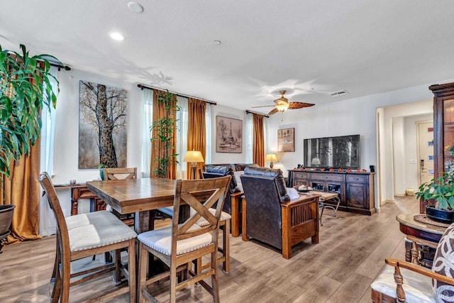 dining space with visible vents, recessed lighting, light wood-style floors, and ceiling fan