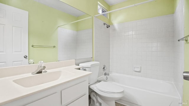 bathroom with vanity, toilet, and shower / bath combination
