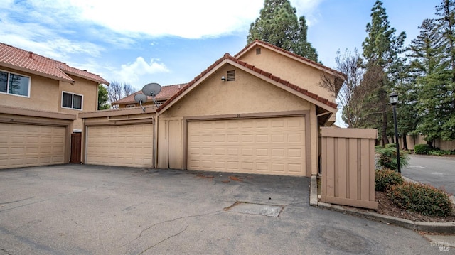 garage with driveway