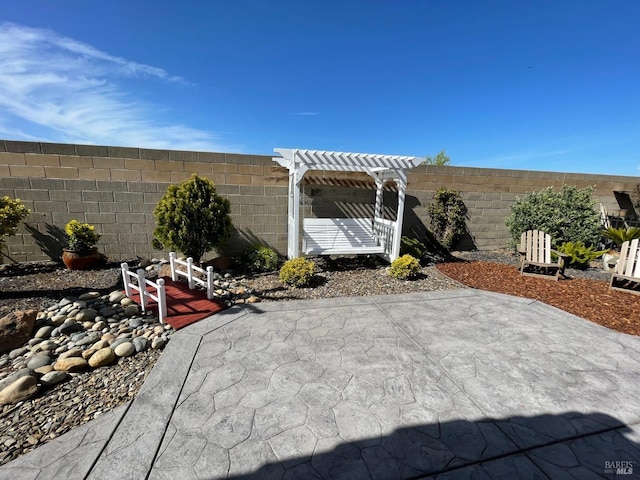 501 Three Rivers Ct, Rio Vista, CA 94571 - view of patio featuring a pergola and a fenced backyard