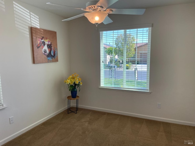 501 Three Rivers Ct, Rio Vista, CA 94571 - carpeted empty room featuring a wealth of natural light, baseboards, and a ceiling fan