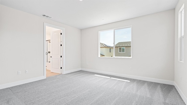 2514 Wisteria Dr, Lodi, CA 95242 - spare room featuring carpet flooring and baseboards