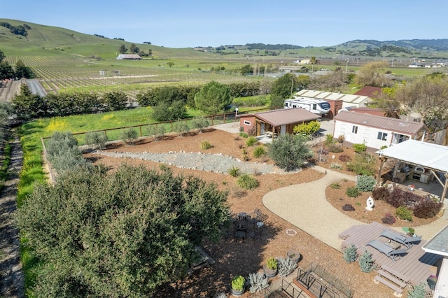 bird's eye view with a rural view and a mountain view