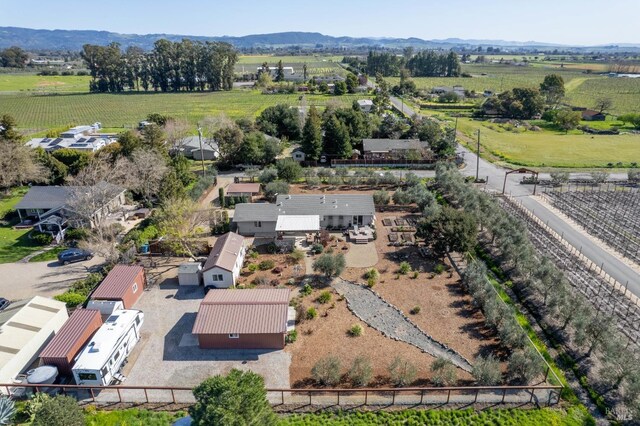 bird's eye view with a rural view and a mountain view