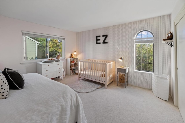 5829 San Juan Way Unit 34, Citrus Heights, CA 95610 - bedroom with multiple windows, carpet floors, and wallpapered walls