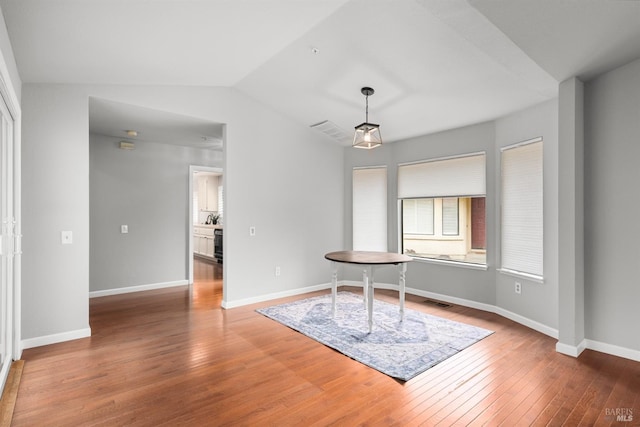 43 Fountain Grove Cir, Napa, CA 94558 - dining room with wood finished floors, baseboards, and vaulted ceiling