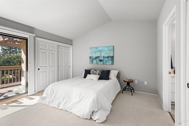 43 Fountain Grove Cir, Napa, CA 94558 - bedroom featuring access to exterior, lofted ceiling, light carpet, baseboards, and a closet
