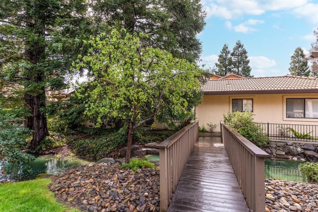 43 Fountain Grove Cir, Napa, CA 94558 - back of house featuring a tiled roof and stucco siding