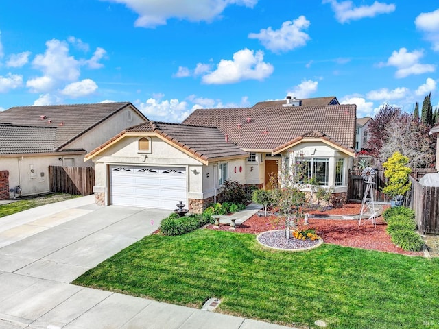 single story home with a tile roof, stone siding, concrete driveway, fence, and stucco siding