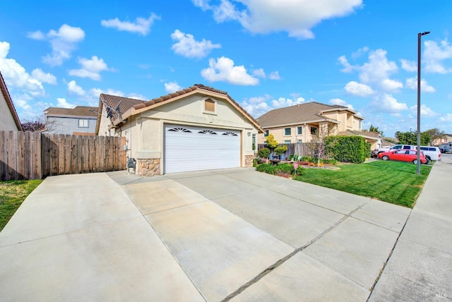 view of front of property featuring stone siding, fence, a front yard, and stucco siding