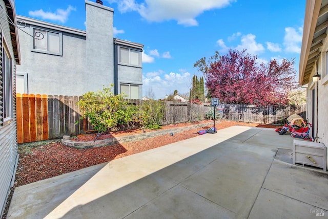 view of patio featuring a fenced backyard