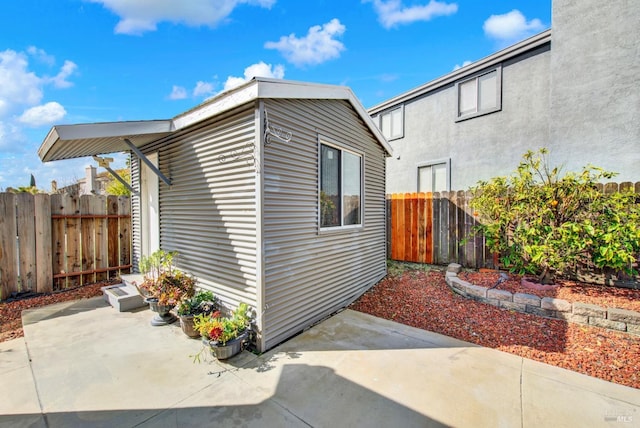 view of home's exterior featuring a patio area, a fenced backyard, and stucco siding