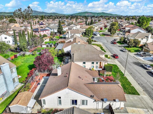 bird's eye view with a mountain view and a residential view