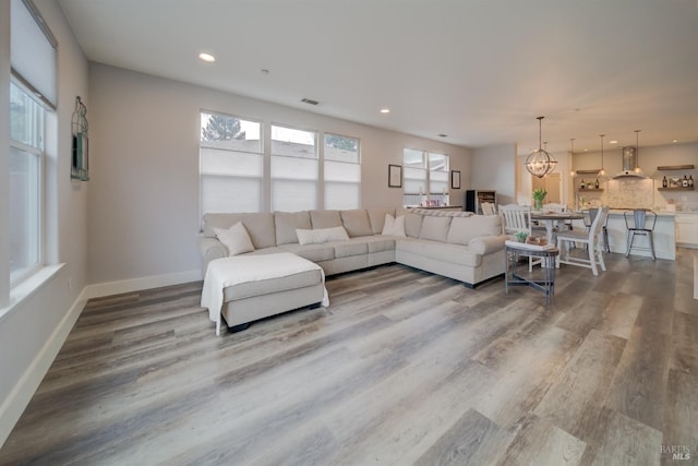3982 Lucero St, Napa, CA 94558 - living area featuring wood finished floors, recessed lighting, a chandelier, and baseboards