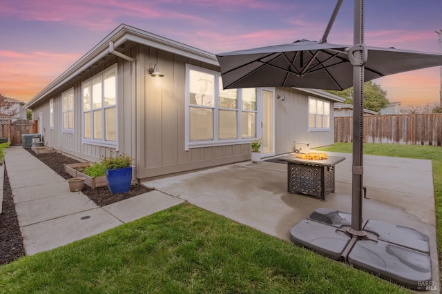 3982 Lucero St, Napa, CA 94558 - back of house featuring an outdoor fire pit, a patio, and board and batten siding
