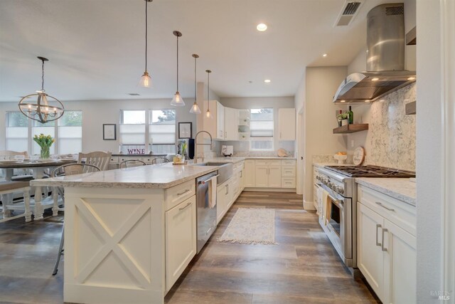 3982 Lucero St, Napa, CA 94558 - kitchen featuring open shelves, island range hood, stainless steel appliances, a sink, and plenty of natural light