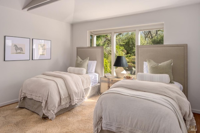 bedroom featuring baseboards