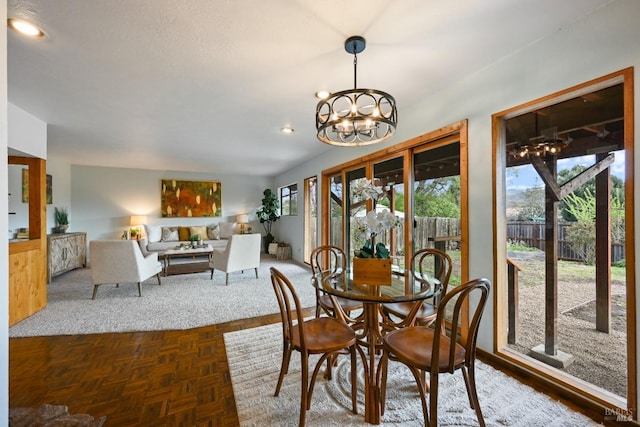 dining area featuring an inviting chandelier and recessed lighting