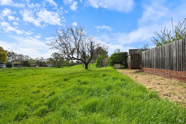 view of yard with fence