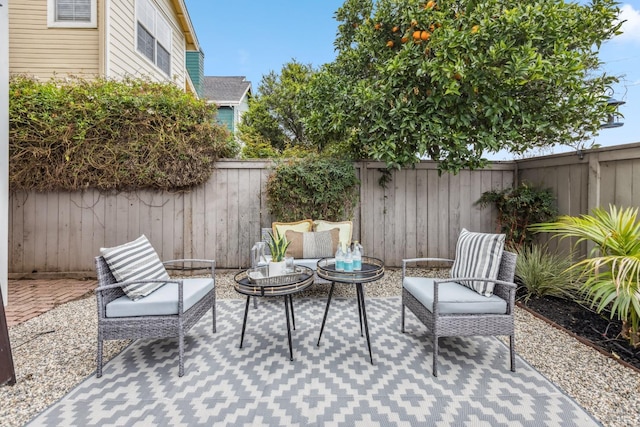 view of patio / terrace with a fenced backyard and an outdoor hangout area