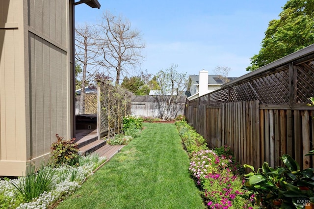 view of yard featuring a fenced backyard