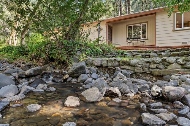 exterior details with a forest view
