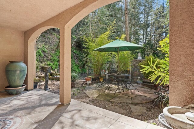 view of patio with outdoor dining area