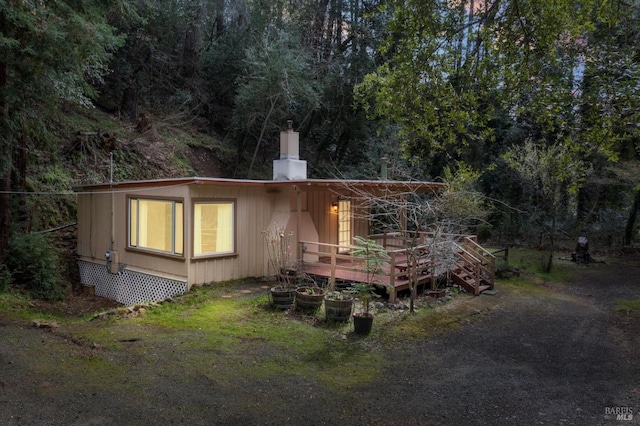 view of front of property featuring a deck