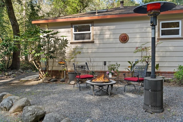 view of patio featuring a fire pit