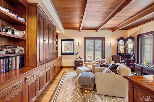 sitting room with wooden ceiling, baseboards, beam ceiling, and light wood-type flooring