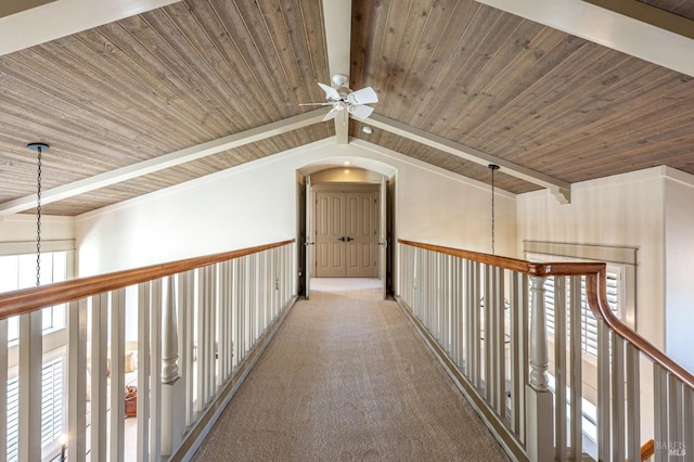 hallway featuring a notable chandelier, wooden ceiling, vaulted ceiling with beams, and carpet
