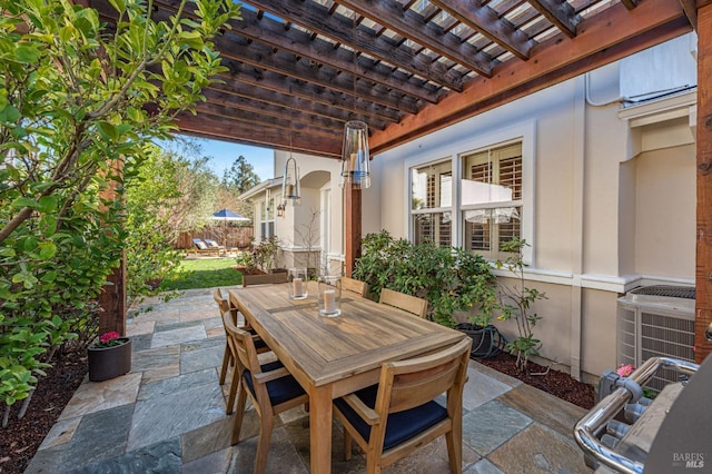 view of patio / terrace with a pergola, central AC, and outdoor dining area