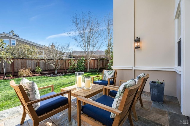 view of patio / terrace with outdoor lounge area and a fenced backyard