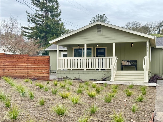 2131 1st Ave, Napa, CA 94558 - view of front facade with a porch, fence, and board and batten siding