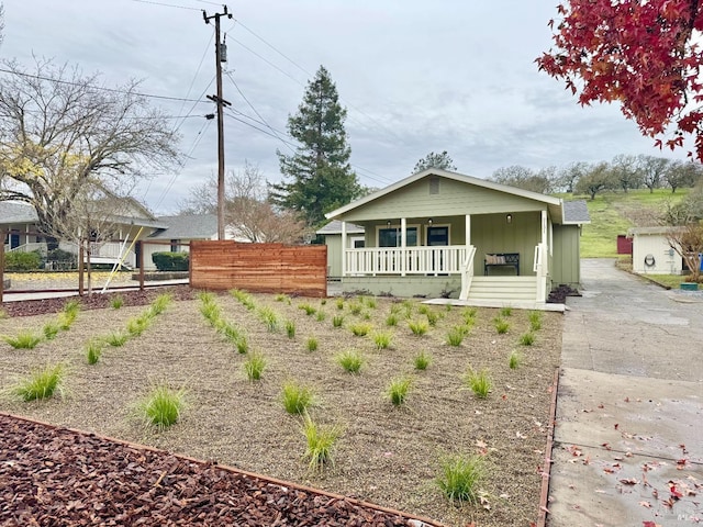 2131 1st Ave, Napa, CA 94558 - view of front facade with concrete driveway, fence, and covered porch