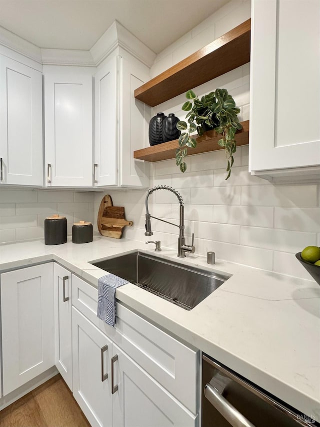 2131 1st Ave, Napa, CA 94558 - kitchen featuring white cabinetry, open shelves, a sink, stainless steel dishwasher, and backsplash