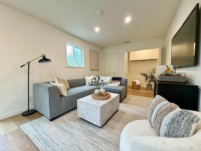 2131 1st Ave, Napa, CA 94558 - living area featuring light wood finished floors, visible vents, and baseboards