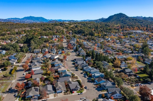 drone / aerial view with a mountain view and a residential view