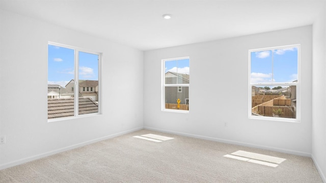 1059 Jarup Dr, Lathrop, CA 95330 - carpeted spare room with baseboards and plenty of natural light