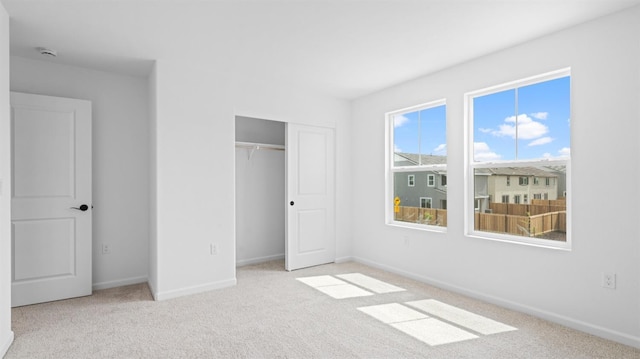 1059 Jarup Dr, Lathrop, CA 95330 - unfurnished bedroom with a closet, carpet floors, and baseboards