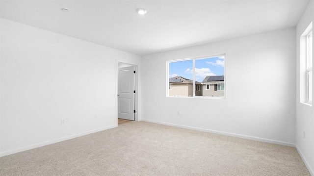 1059 Jarup Dr, Lathrop, CA 95330 - unfurnished room with baseboards and light colored carpet